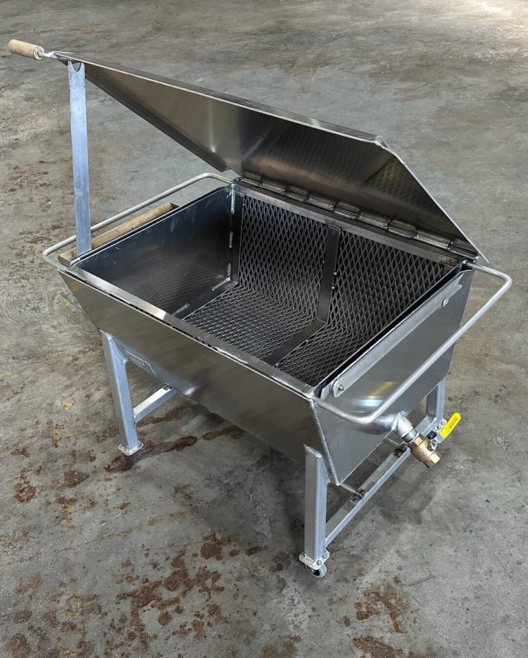 Aluminum grill with the lid open showing the grate, on a stand with a drain valve